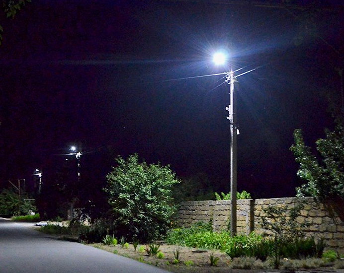 Street light illuminating a path